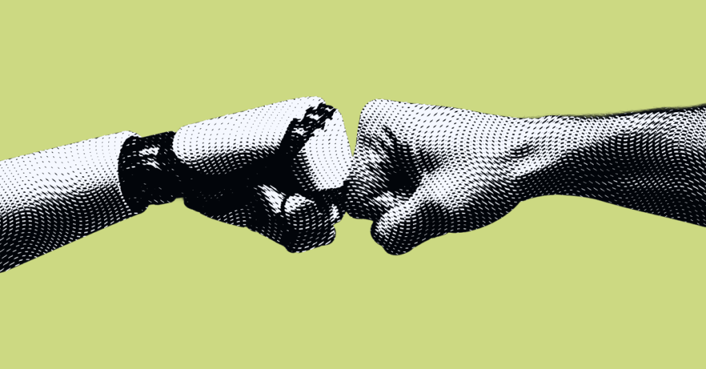 robot and human hand doing a fist bump