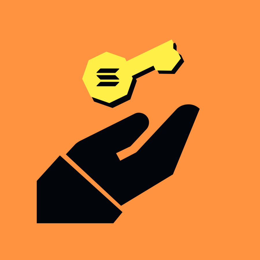 a hand holding a key